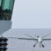 Image of the Mojave unmanned aerial vehicle (UAV), seen here landing on the flight deck of HMS Prince of Wales.

On 15th November 2023, Codenamed “Mojave”, the specially modified remotely piloted aircraft successfully launched from, and then safely landed back onto, the deck of HMS PRINCE OF WALES in a unique trial off the East Coast of the United States of America. A European first, this trial further unlocks the potential of the UK’s Queen Elizabeth-Class aircraft carriers – designed and principally built around the F-35B Lightning stealth fighter – by demonstrating how modern uncrewed air systems can operate alongside 5th generation crewed aircraft.

After months of planning, successful trials of the largest uncrewed aircraft to ever launch from an aircraft carrier outside of the United States have paved the way for the next generation of air power to be delivered from the Royal Navy’s two supercarriers.

The Mojave trial marks the end of a successful series of experiments and tests with uncrewed aircraft to and from our aircraft carriers this autumn, and follows on from the successful demonstration in September when a small W Autonomous Systems logistics supply aircraft delivered supplies to HMS PRINCE OF WALES in the English Channel.  

The Mojave is an adaptation of the MQ1C Grey Eagle aircraft that has been developed for short take-off and landing (STOL), originally to prove STOL operations were capable at unprepared landing sits. With a 17m wingspan, the UAS is 6m wider than an F-35B Lightning steal fighter, and weighs 1.5 tonnes in its fully loaded configuration. The medium altitude, long endurance, remotely piloted aircraft can provided long-range surveillance and strike capability over areas covering many thousands of miles.